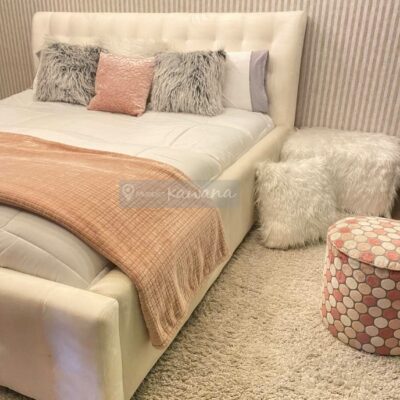 White velvet upholstered king bed