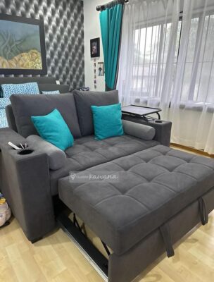sofa cama matrimonial gris oscuro con almohadones turquesa